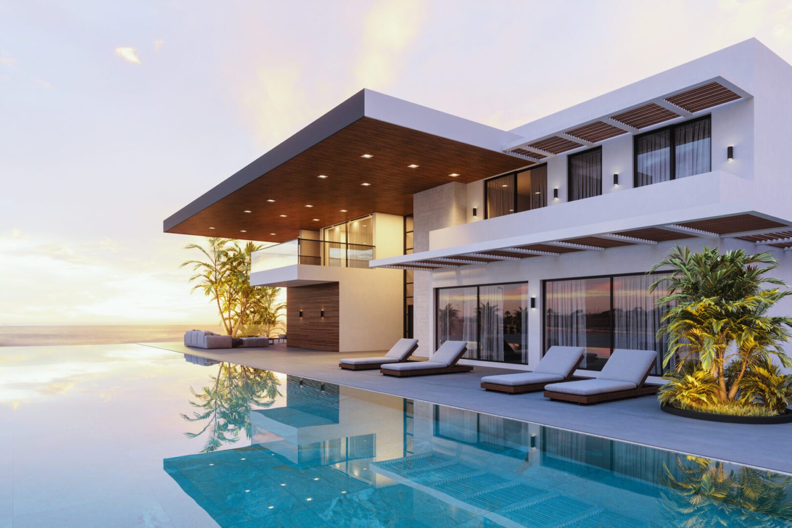 Contemporary beachfront house at sunset